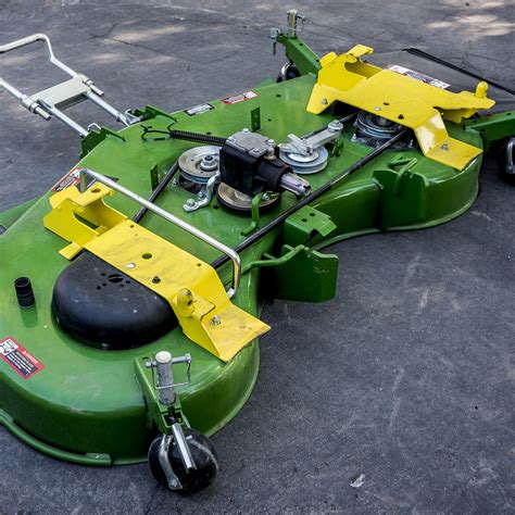 Stamped decks minimize the number of welds and provide a smooth underside, with fewer sharp corners where material could build. . John deere 60d mower deck